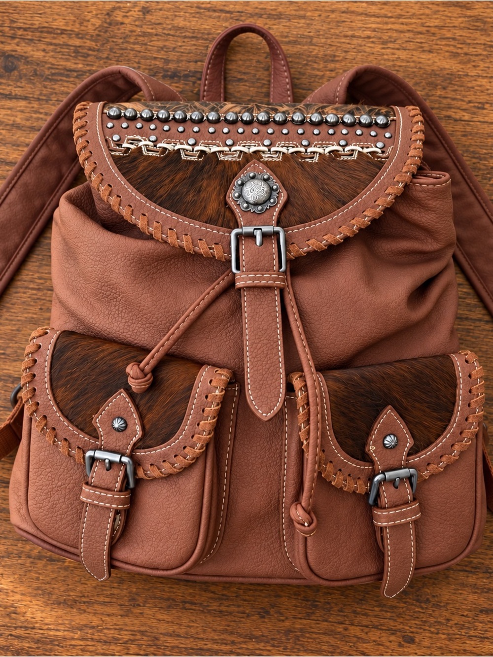 TrinityRanch Cowhide Hair on Embossed Leather Embellished Concho Backpack Purse